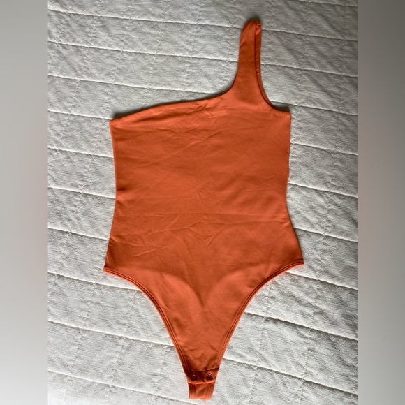 Aritzia Tops - Aritzia Babaton One-Shoulder Orange Bodysuit